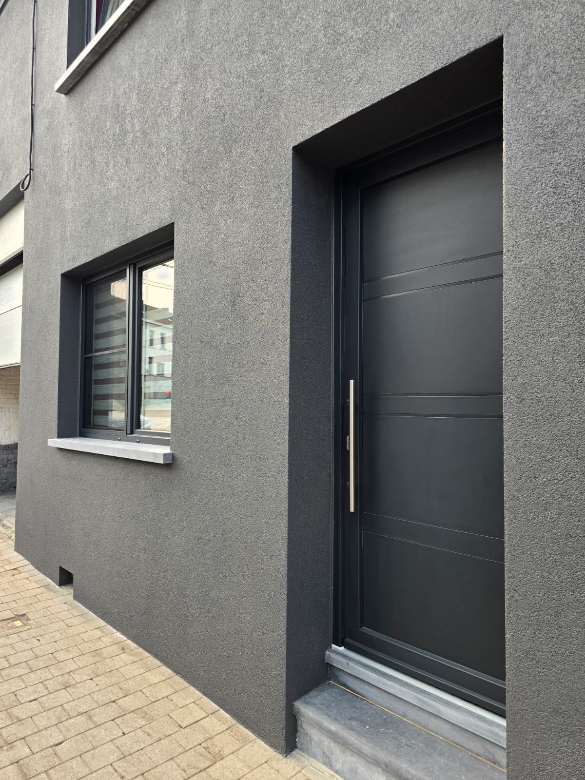 Porte d'entrée noire Concepteo